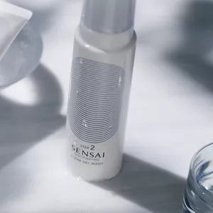 Silky Purifying Clear Gel Wash bottle on surface with reflective mood lighting